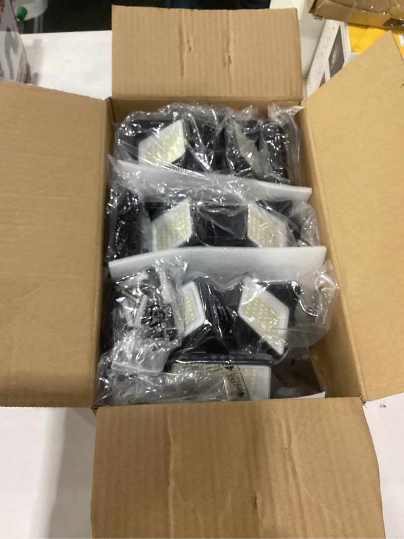 Condition photo showing Good Condition for 6000LM Solar Lights Outdoor Waterproof, 6 Heads Solar Flood Lights Outdoor with 2 Motion Sensor, 310 LED Motion Light with Remote Control for Yard Outside House Patio 3 Pack