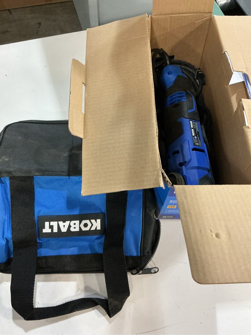 Condition photo showing As Is for kobalt corded 4-amp variable 28-piece oscillating multi-tool kit with soft case (included charger not included)