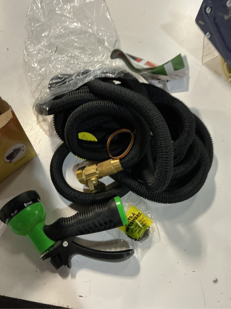 Condition photo showing Good Condition for flexi hose expandable garden hose with 8 function nozzle, 50ft - lightweight retractable garden hose, water hose - no-kink flexibility, 3/4 inch solid brass fittings and double latex core 50ft black