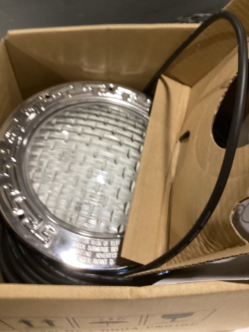 Condition photo showing As Is for pn01dc led inground pool lighting system rgbw color change 10 inch 50w, remote/app control, 120v ac, 100 feet cord