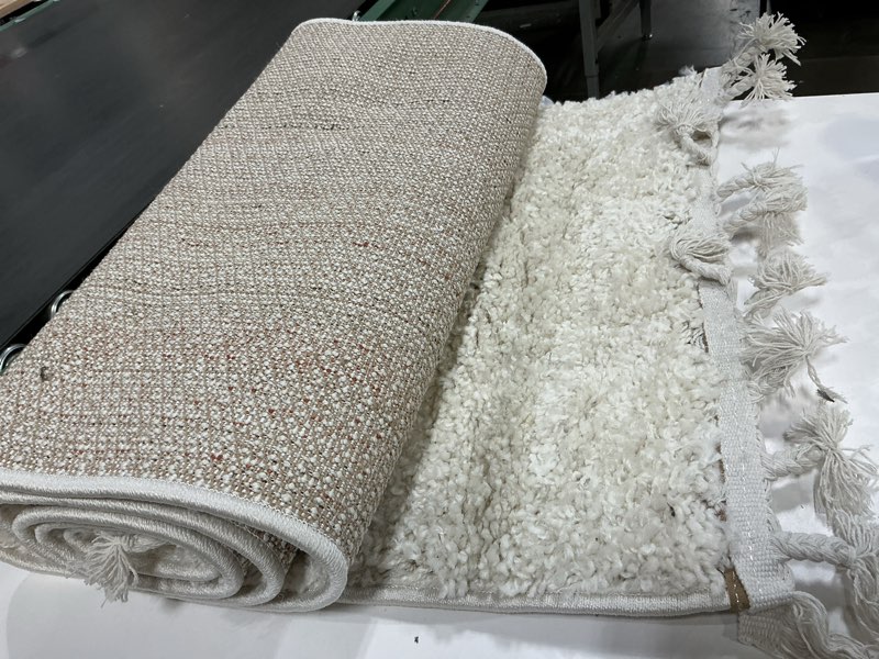 Condition photo showing Good Condition for JONATHAN Y Mercer Shag Plush Tassel Cream Runner Rug, 2x8, Contemporary, Modern, Easy-Cleaning for Living Room, Bedroom, Kitchen, Pet Friendly, Non-Shedding (MCR100D-28) Cream With Tassel 2'3" x 8' (Runner)