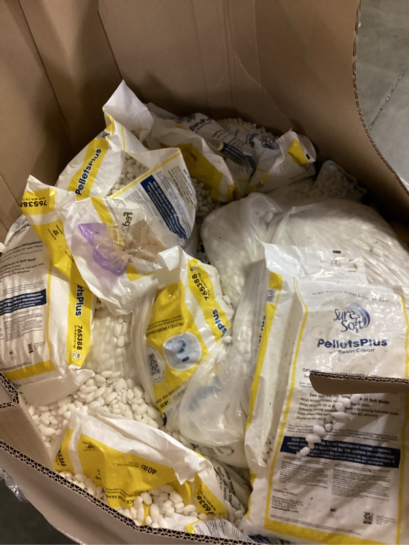 Condition photo showing As Is for pallet lot of 40 lb. premium salt pellets plus water softener with resin clean (approximately 25 bags)