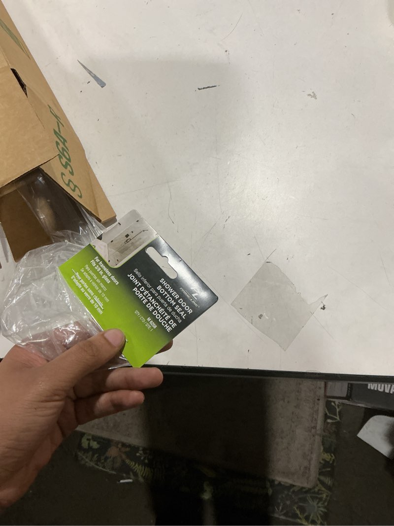 Condition photo showing Good Condition for prime-line m 6258 frameless shower door bottom seal for 3/8 in. thick glass doors – stop shower leaks and create a water barrier, 36 in., clear vinyl (single pack) clear 3/8 in. single flap