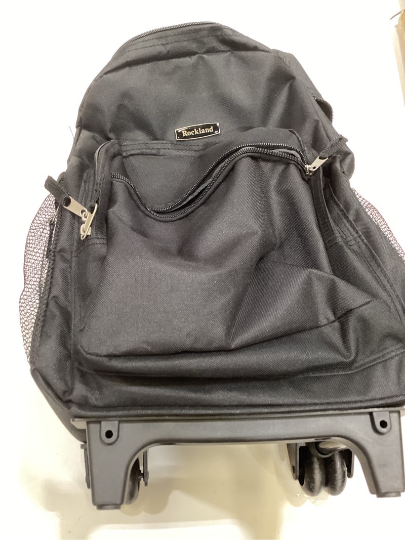Condition photo showing Good Condition for rockland double handle 17" rolling backpack, black