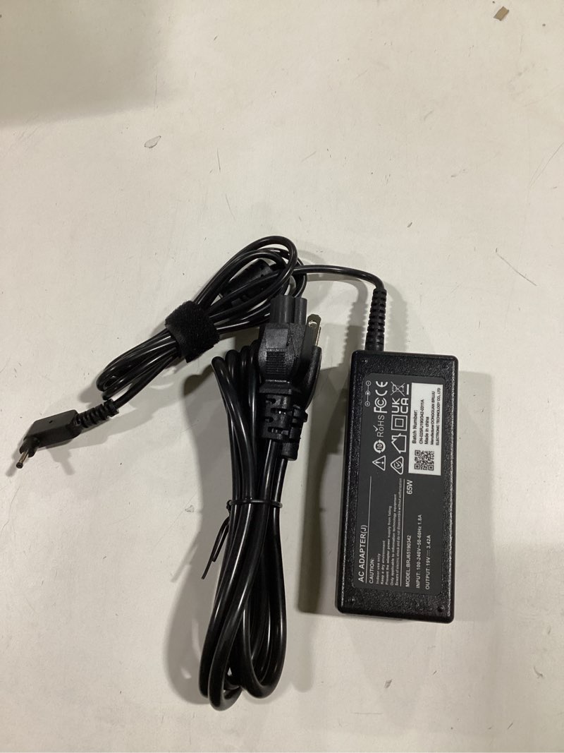 Condition photo showing Good Condition for New 65W AC Charger 