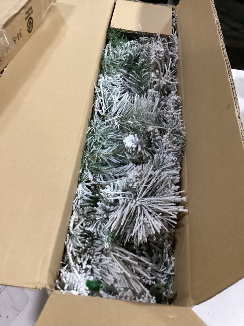 Condition photo showing Good Condition for Puleo International 9' Flocked Spruce Garland with 160 Tips