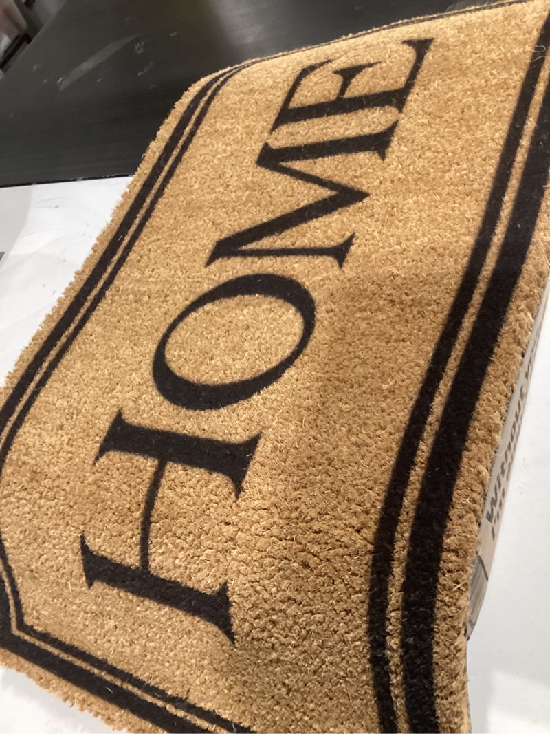 Condition photo showing New/Like New for natural coco coir home welcome mat with heavy duty backing, 17" x 30" anti-slip front door mat outside entrance, minimalist original design outdoor indoor mats for entry, porch, patio, mudroom home script