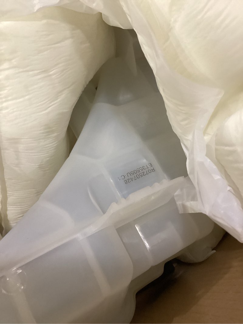 Condition photo showing New/Like New for Engine Coolant Reservoir for unknown make and model