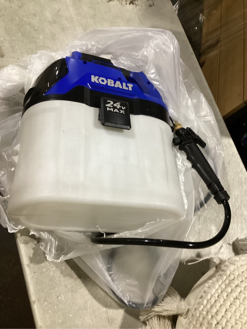 Condition photo showing As Is for kobalt 2.11-gallon 24-volt battery operated plastic handheld sprayer