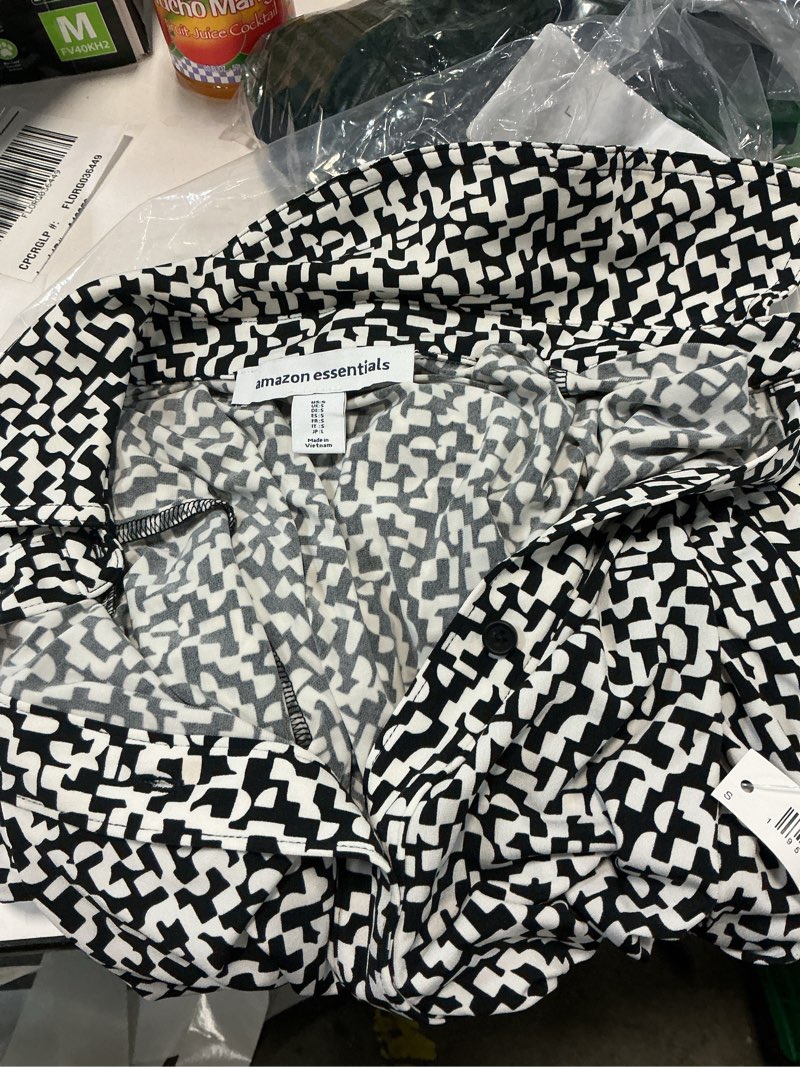 Condition photo showing New/Like New for amazon essentials women's regular-fit matte jersey button-down shirt small black ivory geometric