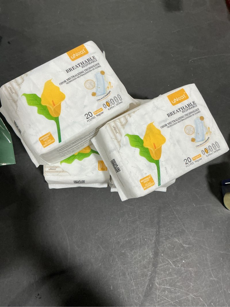 Condition photo showing New/Like New for uNeat Ultra Thin Pads with Wings for Women, Sanitary Napkins for Teen and Tweens, Regular Absorbency, Unscented, Eliminates Odor (Regular, Size 2, 80 Count) Regular 4 Pack