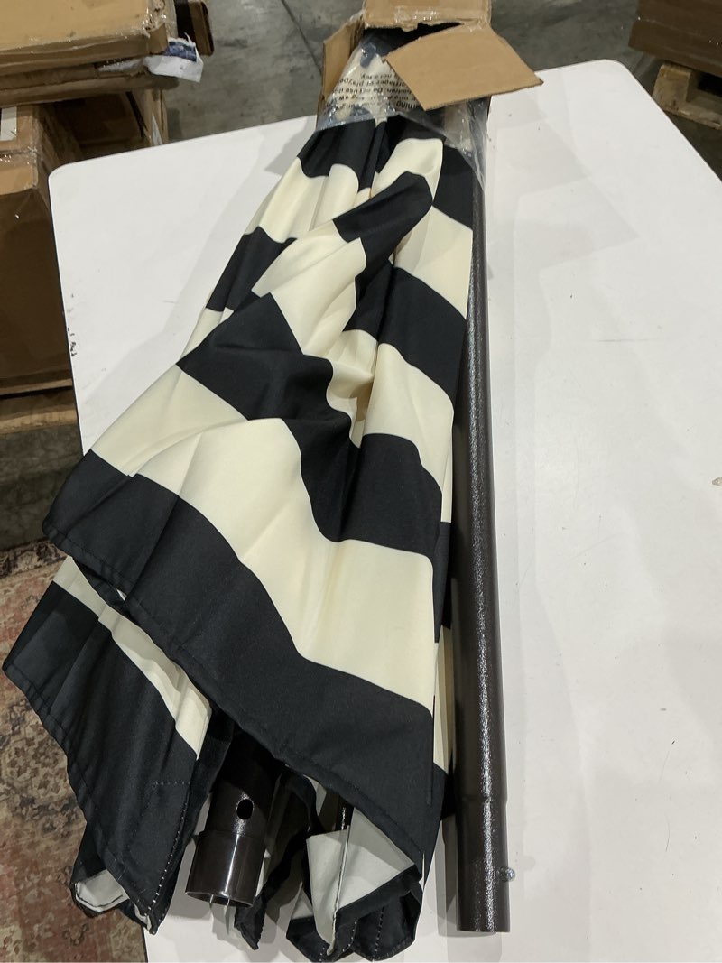 Condition photo showing Good Condition for blissun 9' outdoor patio umbrella, outdoor table umbrella, yard umbrella, market umbrella with 8 sturdy ribs, push button tilt and crank black & ivory