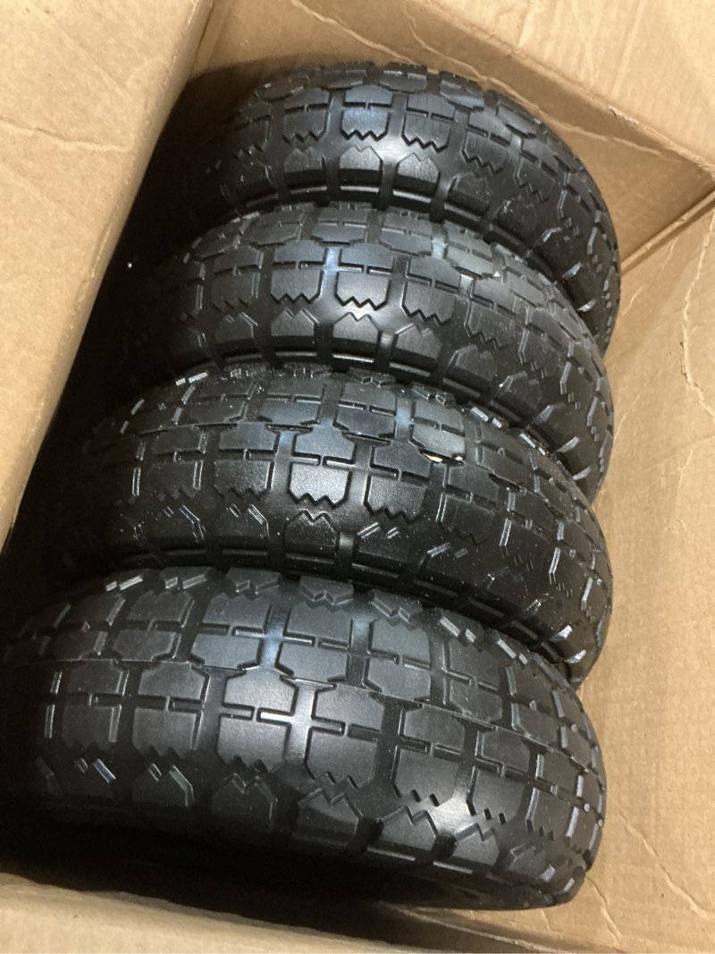 Condition photo showing Good Condition for 10-inch 4.10/3.50-4" flat-free solid tire and wheel with 5/8" axle bore hole, 2.2" offset hub for hand truck garden wagon cart trolley dolly lawn mover go kart replacement tire, 4 pack 4.10/3.50-4 | 4 pack