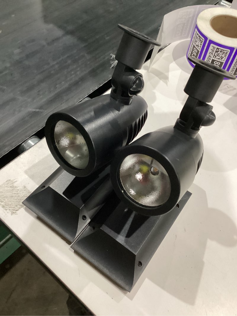 Condition photo showing As Is for https://www.homedepot.com/p/reviews/hampton-bay-solar-50-lumens-black-outdoor-integrated-led-adjustable-beam-spotlight-2 pack-weather-water-rust-resistant-93021/317458452/3