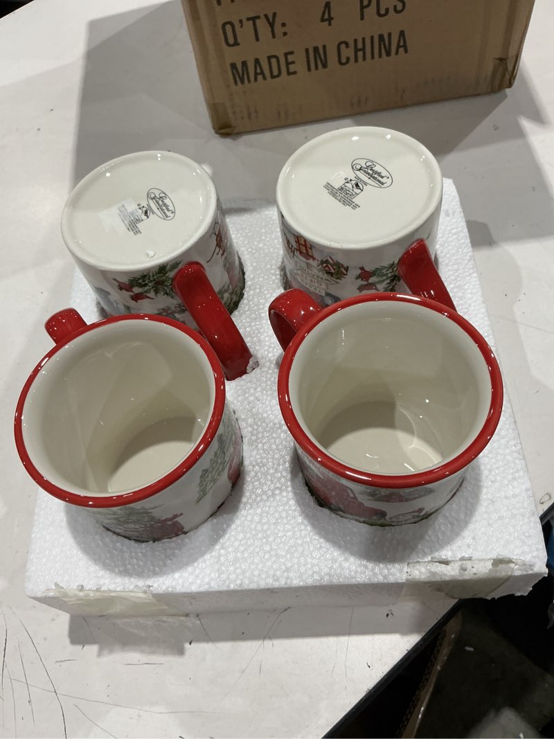 Condition photo showing Good Condition for red truck snowman set of 4 ceramic mugs – cozy up with coffee, tea, or cocoa in these delightful mugs featuring red trucks and snowmen, perfect for holiday mornings or fireside sipping 16 oz