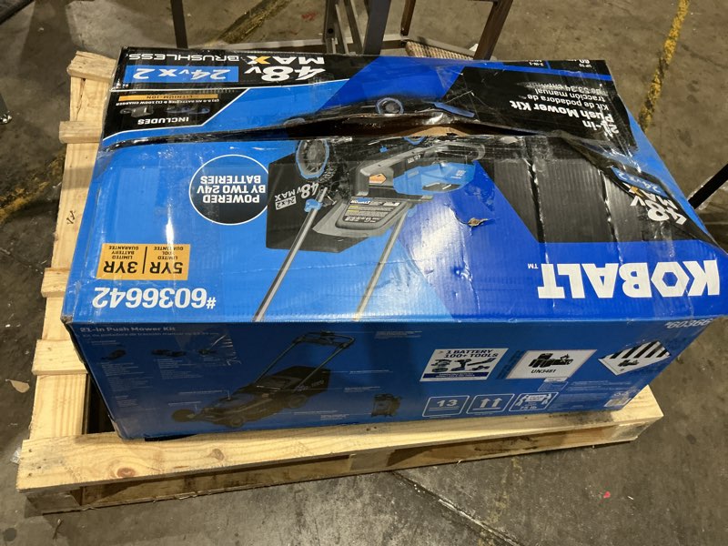 Condition photo showing As Is for kobalt 48v max (24vx2) 21-in dual blade self-propelled mower kit, (2) 8.0ah batteries and charger included