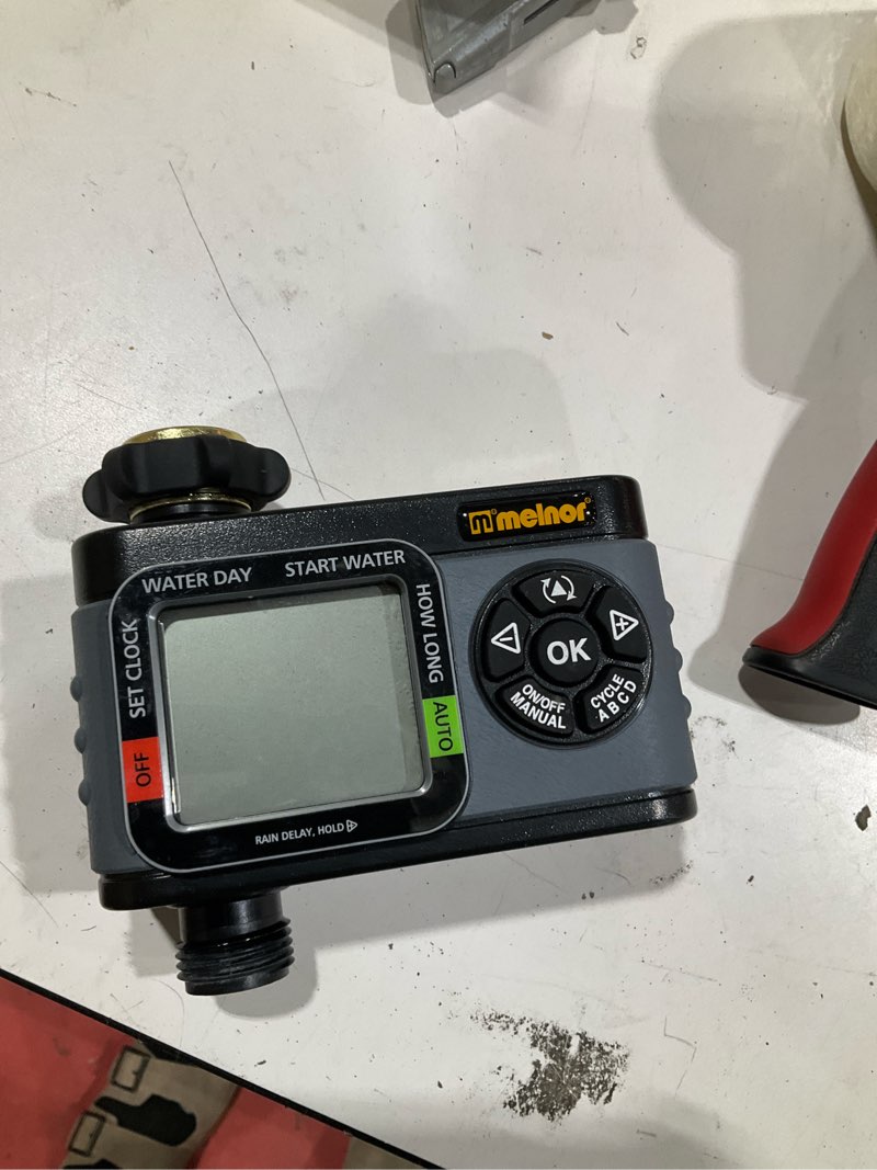 Condition photo showing As Is for melnor 1 output port stationary digital hose end timer