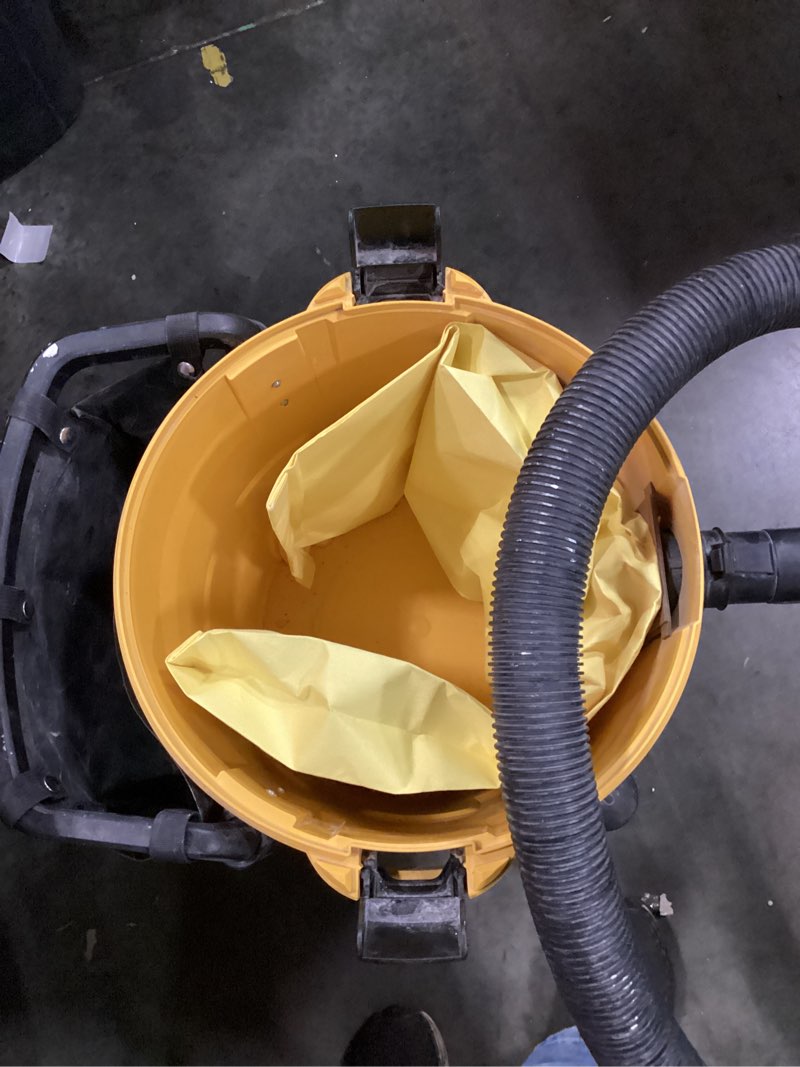 Condition photo showing As Is for dewalt stealthsonic quiet 12-gallon 5.5 hp corded wet/dry shop vacuum with accessories