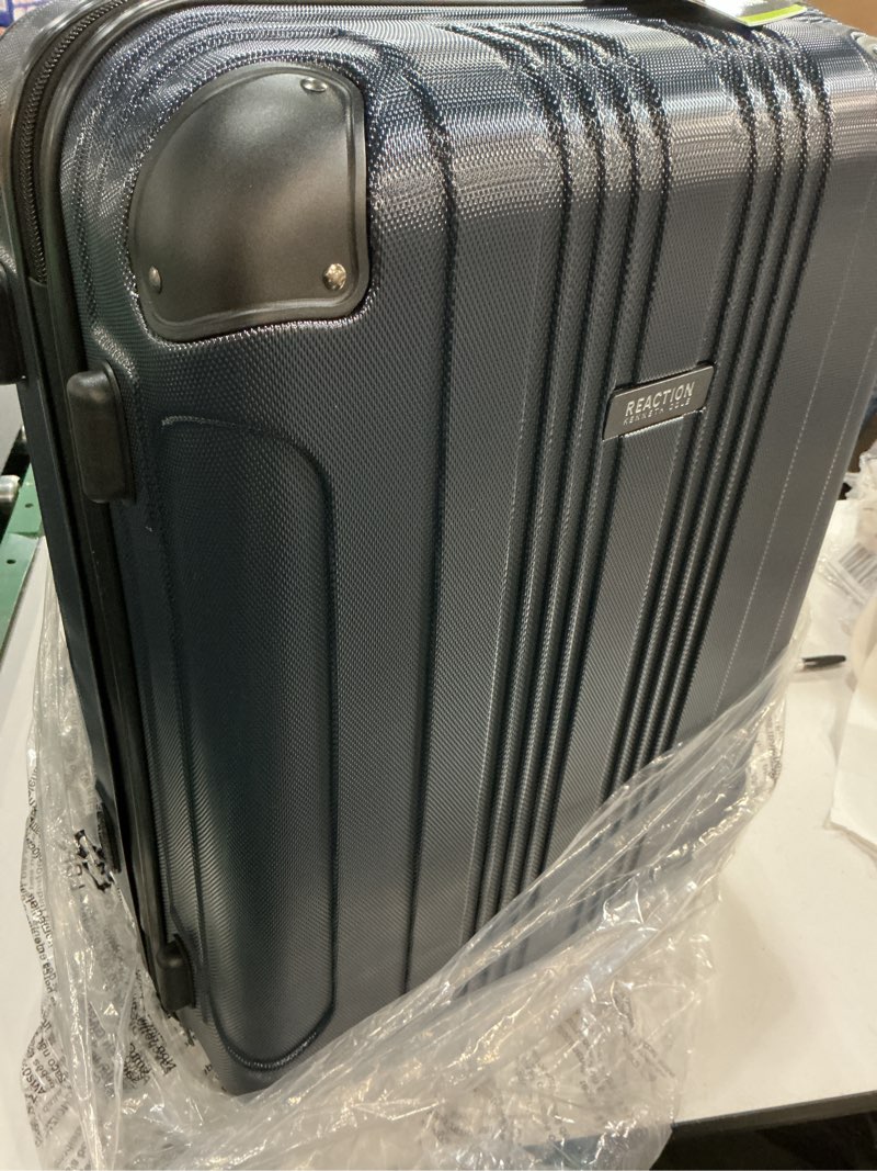 Condition photo showing Good Condition for Kenneth Cole REACTION Out of Bounds Lightweight Hardshell 4-Wheel Spinner Luggage, Naval, 24-Inch Checked