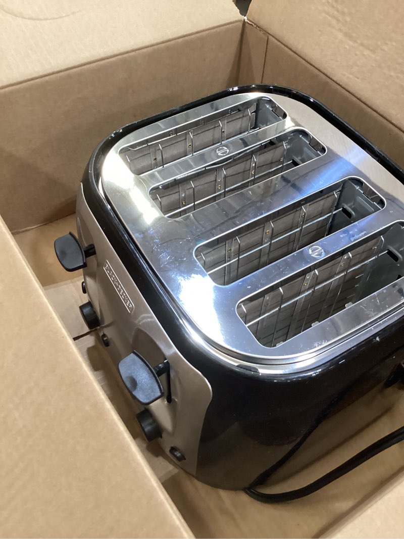 Condition photo showing Good Condition for black+decker 4-slice toaster, extra wide slots, 7 shade settings, 1400 watts, frozen and bagel buttons, toast shade selector, extra lift 4-slice black