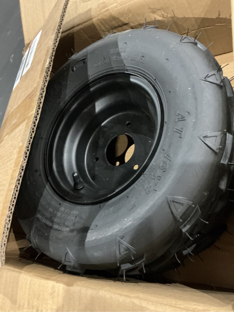 Condition photo showing As Is for wheel rim tire assembly
