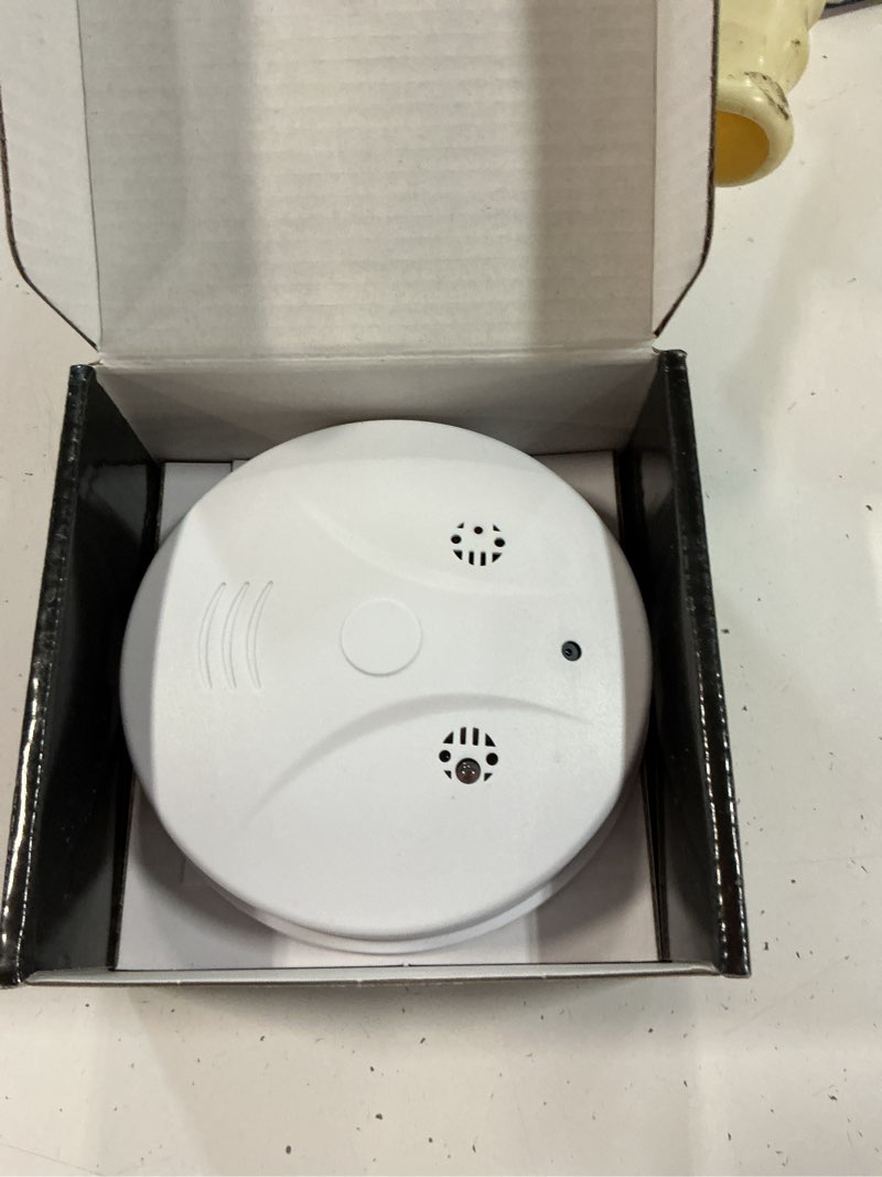 Condition photo showing As Is for wifi mini detector camera,1080p wireless security nanny cam smoke detector camera with motion detection/night vision/remote view for home and office surveillance, no audio