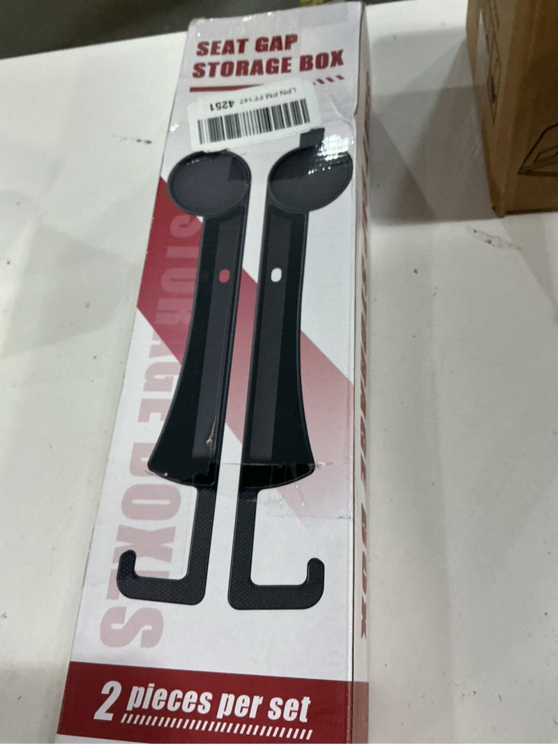 Condition photo showing New/Like New for Car Seat Seat Filler 2-Piece Set to Fill The Void Between Seat Seat Blocker to Prevent Items from Drop, 4-in-1 Multifunctional Water Cup Holder Hook Large Capacity Storage Universal SUV Sedan Truck