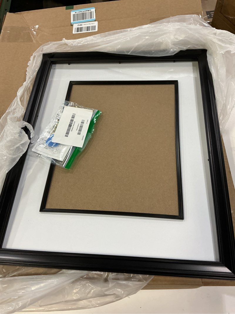 Condition photo showing As Is for Yaetm 16x20 Black Picture Frame with Decorative Inner Frame & Tempered Glass, Display 11x14 Photos with Mat on Wall - Portrait or Landscape - Ideal for Office & Home Décor (Black, Single) 16x20 - 1 pack Black