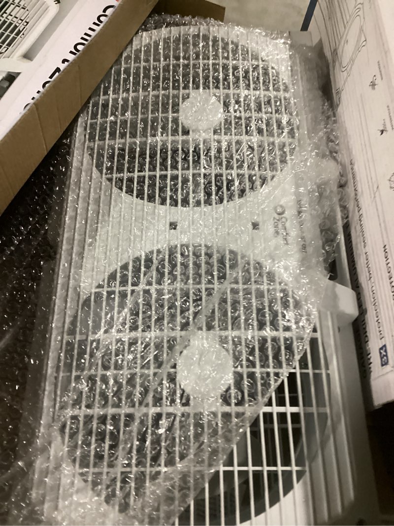 Condition photo showing New/Like New for comfort zone 9  twin window fan with quiet setting  reversible airflow control  3-speeds  expandable  exhaust  dual fan  airflow 9.84 ft/sec  ideal for home  kitchen  bedroom & office  cz319wt2