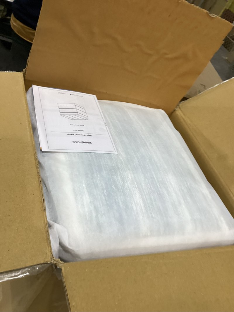 Condition photo showing As Is for SIMPLIHOME Naya Cube Pouf - 16 inch Wide Upholstered Handwoven Cotton Ottoman in Blue Melange, Boho Footstool or Extra Seating for Living Room or Bedroom with Polystyrene Filling, Assembled Cotton Pouf Blue Melange