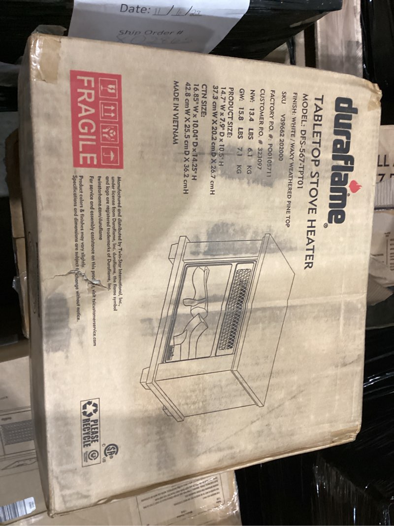 Condition photo showing As Is for duraflame  TABLETOP STOVE HEATER  MODEL: DFS-567-PB01  FINISH:White/Whaxy Weathered Pine Top