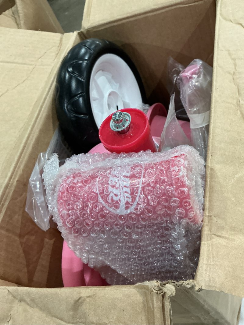 Condition photo showing As Is for radio flyer pink rider trike, ages 2.5-5, adjustable seat, steel construction, quiet ride wheels, storage bin, comfort grip handlebars, tricycle for toddlers, amazon exclusive