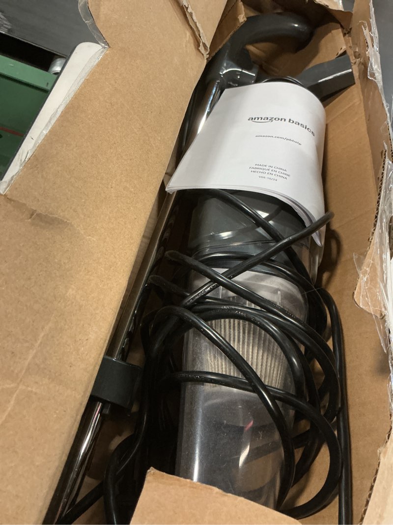 Condition photo showing As Is for amazon basics 2-in-1 corded stick vacuum cleaner, converts to handheld, lightweight (3.9 lbs), with washable filter, crevice tools, 0.5l dust cup, self-standing, 19.7-ft cord, 300w, black