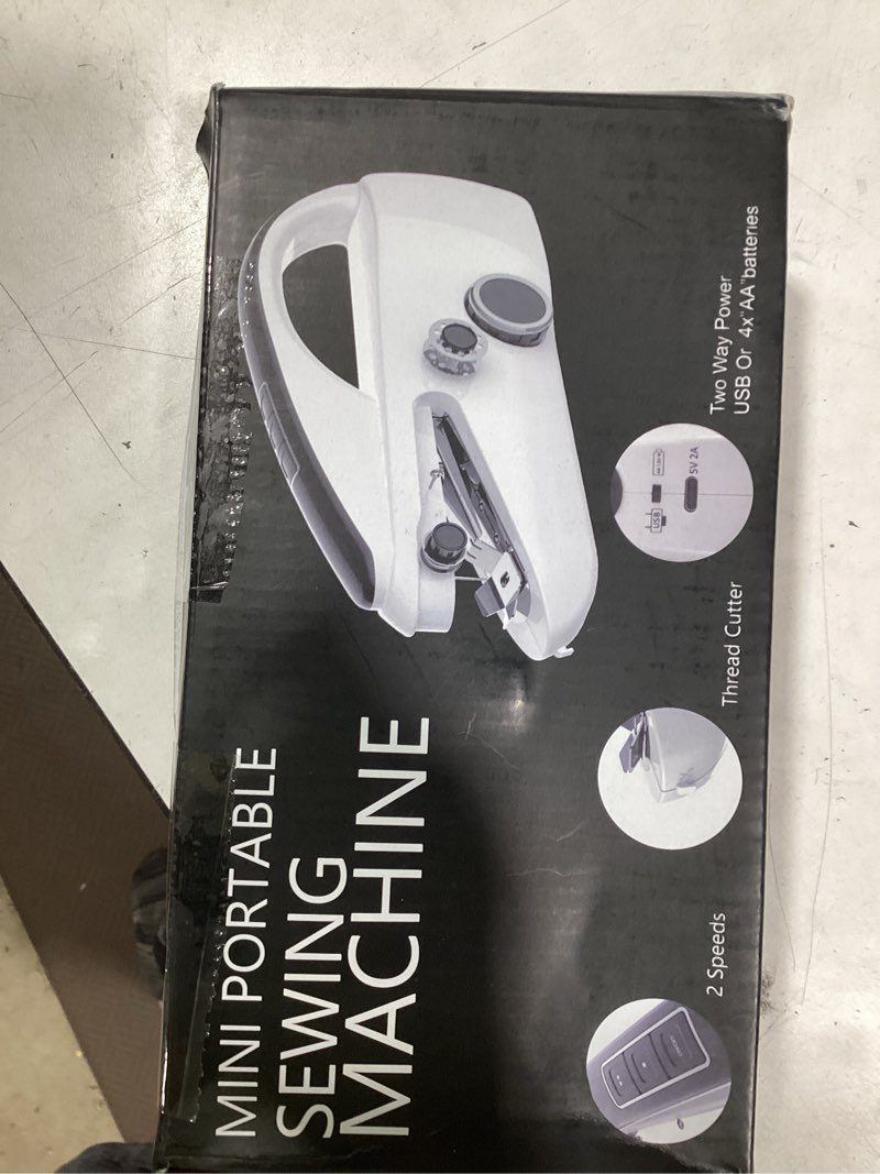 Condition photo showing As Is for handheld sewing machine, mini electric handy sewing machine,