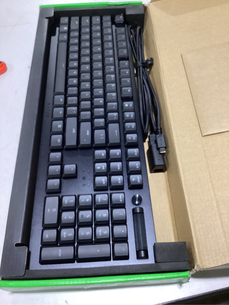 Condition photo showing As Is for Razer DeathStalker V2 Pro Wireless Gaming Keyboard: Low Profile Optical Switches Clicky Purple - HyperSpeed Wireless & Bluetooth - Chroma RGB - Up to 200 Hr Battery - Snap Tap Classic Black V2 Pro Clicky Optical Switch