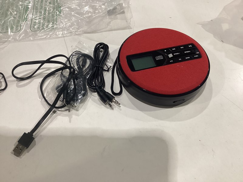Condition photo showing New/Like New for not tested cd player portable, rechargeable portable cd player with dual speakers and anti skip,cd,usb,aux,lcd display,backlit button,5 eq,a-b repeat,10 speeds for home car fabric, red