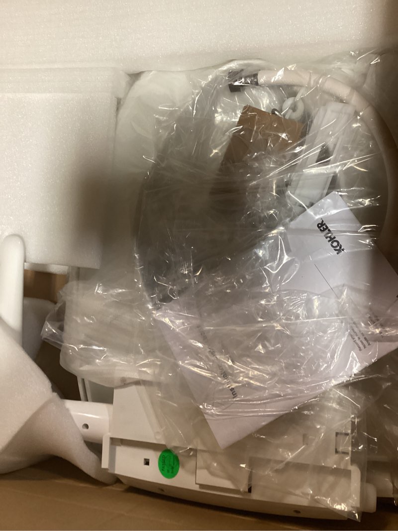 Condition photo showing As Is for kohler purewash m250 manual elongated bidet toilet seat, white, quiet-close lid prevents slamming, cool water, easy installation with quick-release hinges, adjustable spray position & pressure white elongated