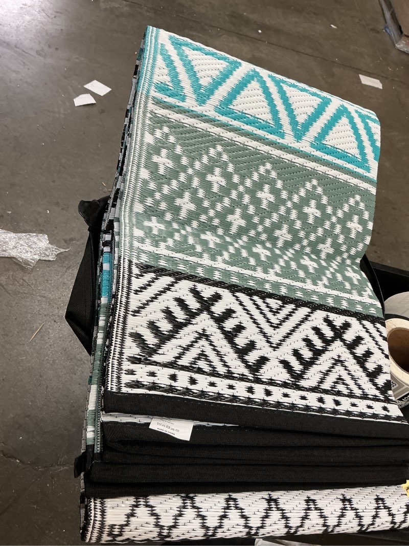 Condition photo showing Good Condition for montvoo outdoor rug carpet waterproof-patio rug mat 5x8 reversible rv outdoor camping rugs picnic beach mats plastic straw outside rugs for balcony porch pool deck boho patio decor