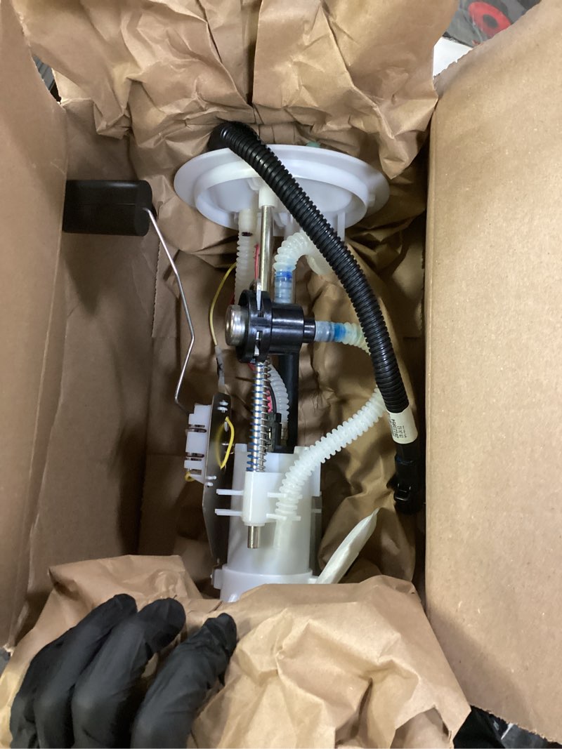 Condition photo showing As Is for fuel pump and sender assembly