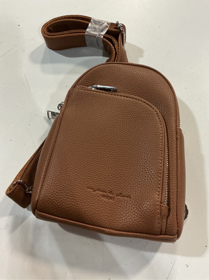 Condition photo showing Good Condition for inicat rfid blocking sling bag, anti theft crossbody bag for women compact travel purses leather brown