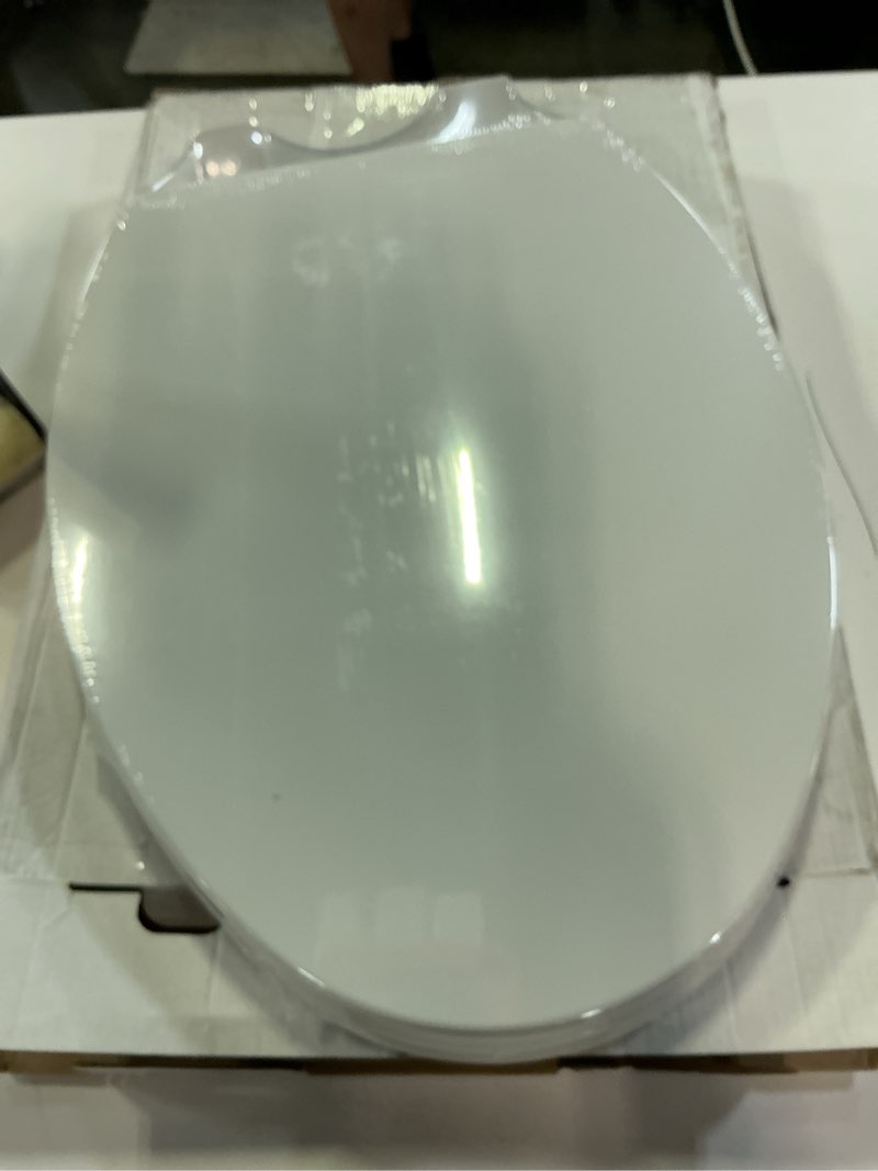 Condition photo showing New/Like New for elongated toilet seat, slow close, white plastic, never loosen, 18.5” | easy installation, easy cleaning, non-slip bumpers, quiet operation, fits most elongated toilets white elongated(oval)
