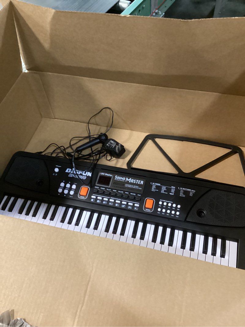 Condition photo showing Good Condition for 61-Key Kids Piano Keyboard for Beginners - Rechargeable Electronic Music Toy Piano with Music Stand Microphone LED Display AUX in - Birthday for 3-9 Year Old Boys Girls (Black)