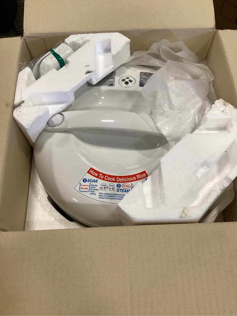 Condition photo showing New/Like New for zojirushi 10-cup automatic rice cooker & warmer - tulip
