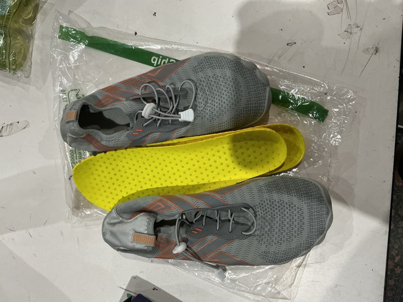 Condition photo showing As Is for men/women water shoes 