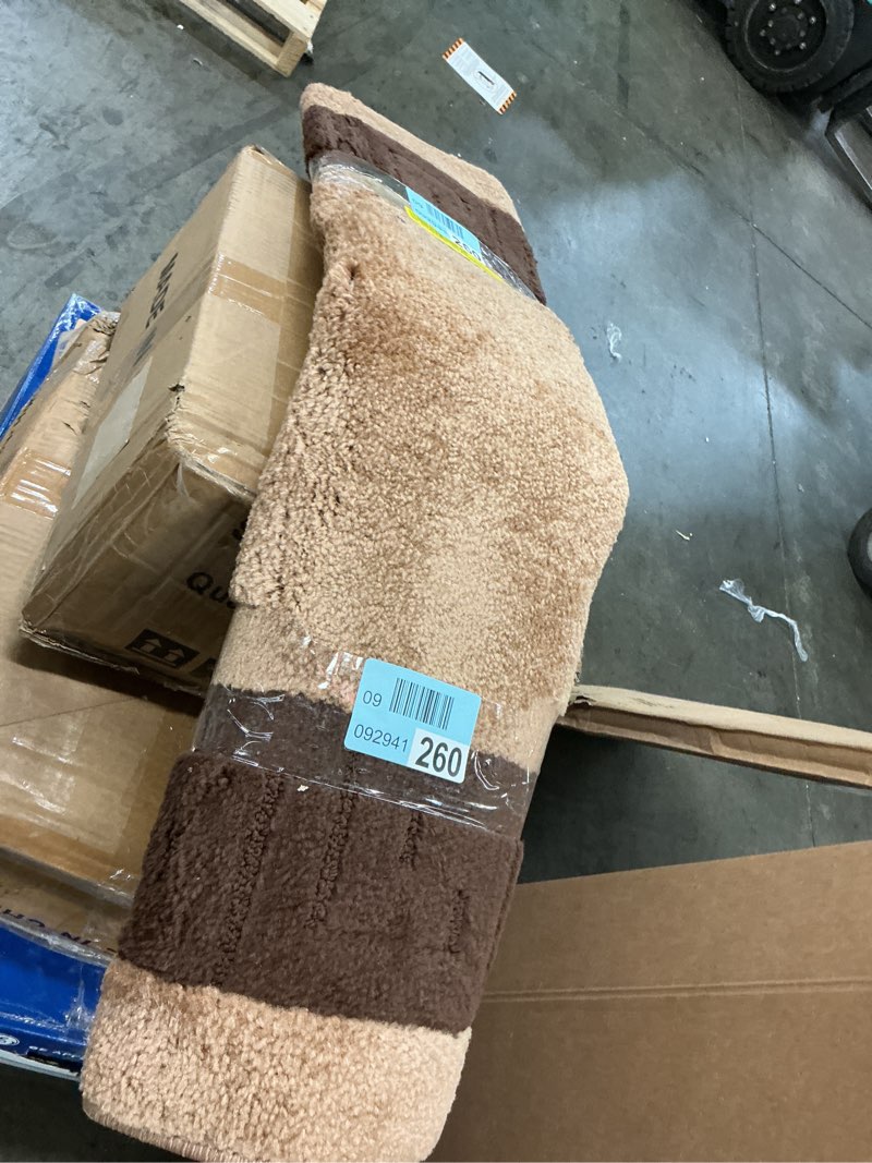 Condition photo showing As Is for machine washable multicolor rug