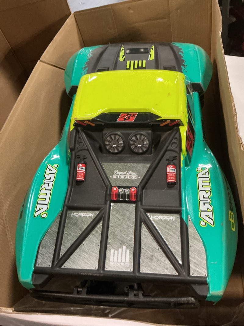 Condition photo showing As Is for ARRMA RC Truck 1/10 Fury 2wd 223S BLX Brushless Short Course Truck RTR (Battery and Charger Not Included) with DSC, Green, ARA3521T2