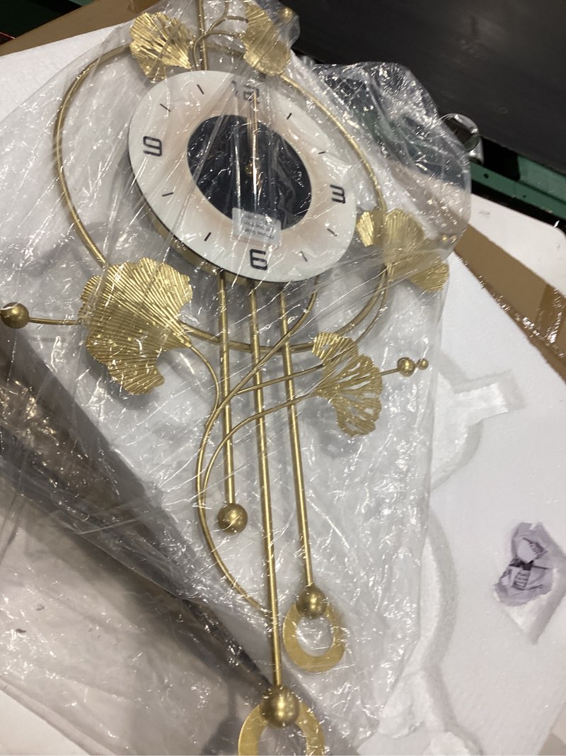 Condition photo showing Good Condition for wall clock, large modern wall clock for living room decor 20 x 31.5 inches?unique office clocks battery operated?oversized modern wall art for bedroom,farmhouse,office wall decor 20" x 31.5" gold ginkgo leaf