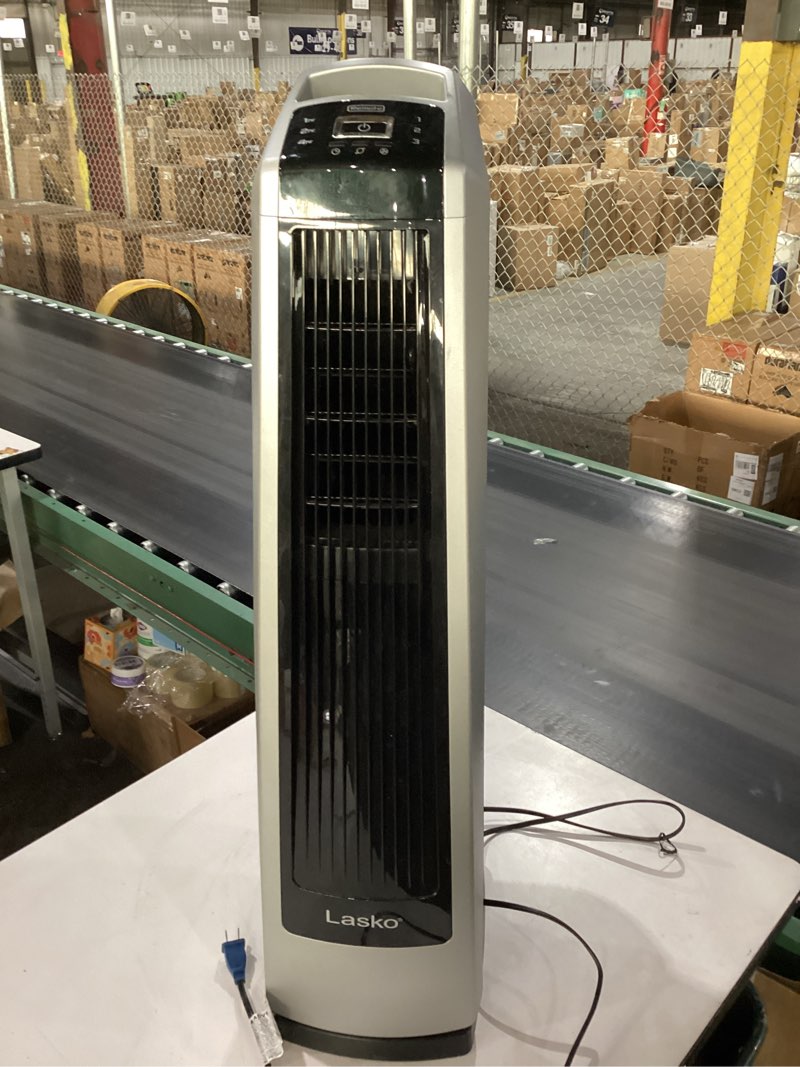 Condition photo showing Good Condition for *not tested* lasko high velocity oscillating tower fan for bedroom, garage, basement, and gym with remote control, timer, 3 powerful speeds, 35\" silver/black, u35115