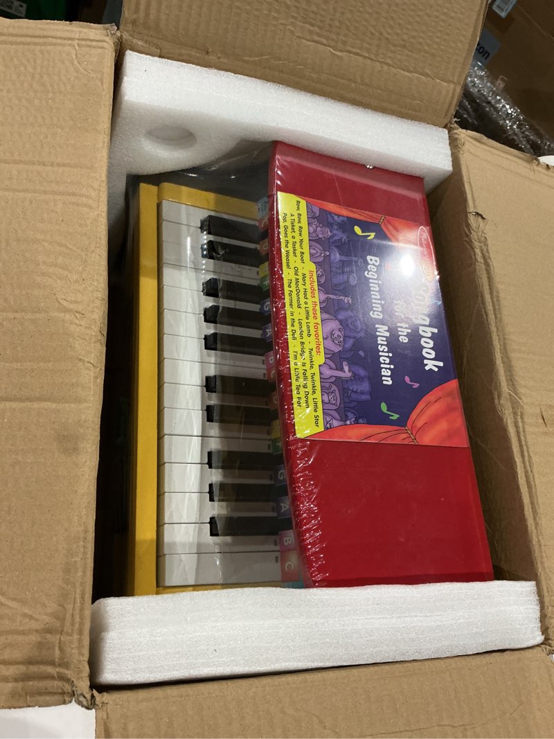 Condition photo showing Good Condition for melissa & doug learn-to-play piano with 25 keys and color-coded songbook toy piano kids, toddler toys for ages 3+