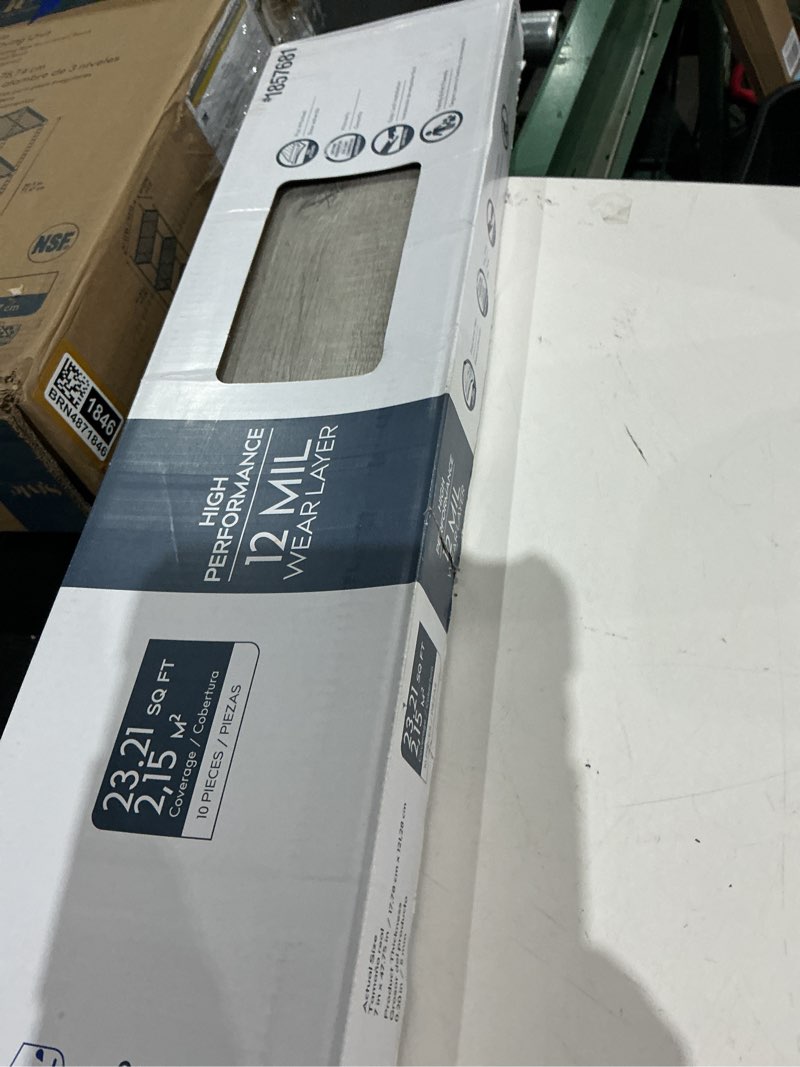 Condition photo showing As Is for procore plus charleston oak 7-in x 47.75-in waterproof interlocking luxury vinyl plank flooring (23.21-sq ft)